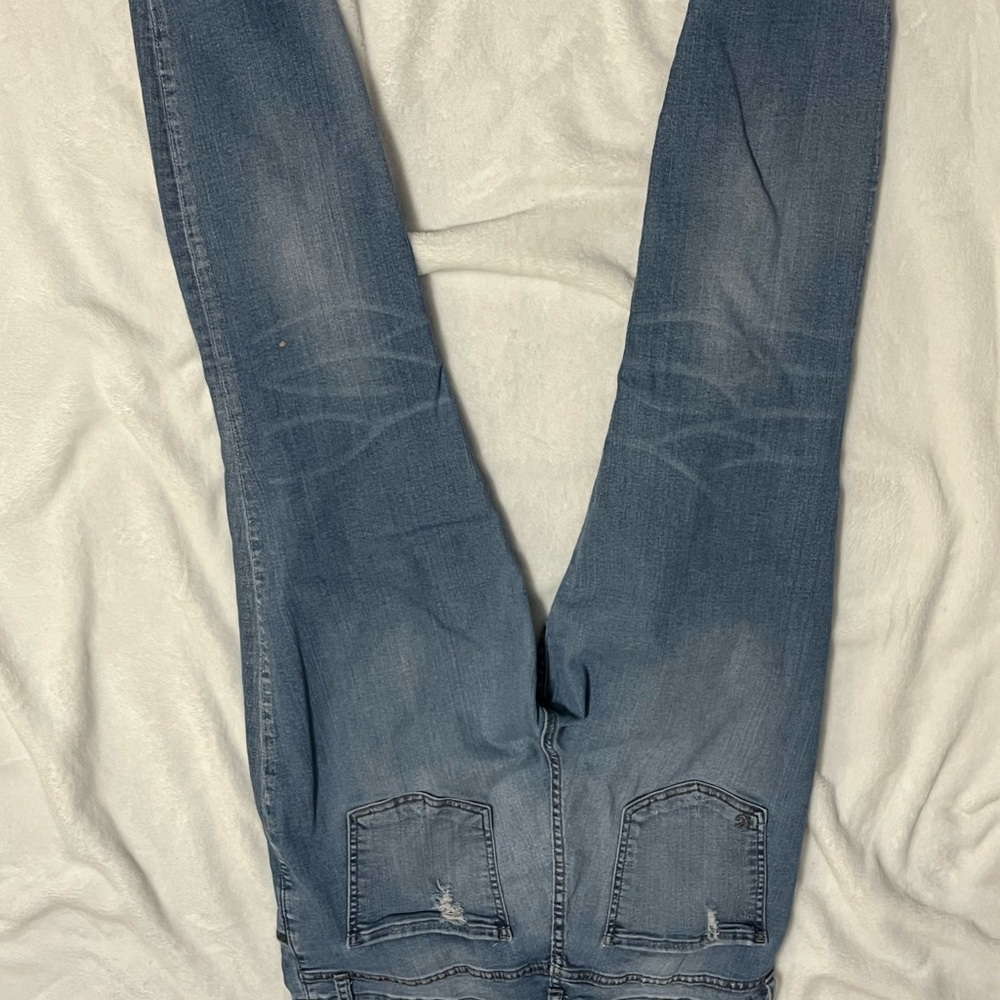 Distressed Blue Denim Jeans